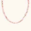 Close-up of faceted natural pink stone beads on an 18K gold plated stainless steel necklace - Natural Stone Necklace - Pink Opal