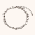 Pulsera de eslabones en forma de lazo de acero inoxidable plateado con cierre ajustable - Tobillera Artesanal Con Lazo