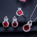 Luxe zilveren sieradenset met rode edelstenen en diamanten in een kalebas ontwerp - Maat 6 / Granaatrood