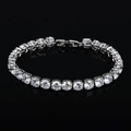 Classic tennis bracelet with AAA cubic zirconia in silver plating on black background - White (18cm)