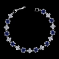 Detailed view of floral zircon bracelet with blue crystals and silver-tone finish - Sapphire Blue