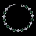Detail view of emerald green zircon bracelet with white floral accents and folding clasp - Green