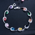 Modieuze zilveren armband met kleurrijke ovale edelstenen en fonkelende kristallen - Kleurrijk
