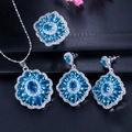 Macro shot of silver jewelry set with blue oval gemstones and sparkling cubic zirconia - Sea Blue Style (Size 6)