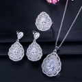 Macro detail of pear-shaped zircon jewelry set featuring necklace ring and earrings - White / Number 6