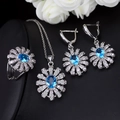 Etnische sieradenset met zonnebloemdesign en blauwe stenen op zwart leer - Maat 6 / Aqua