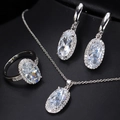 Elegant zircon bridal jewelry set featuring oval crystals on a black leather stand - White Size 6