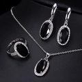 Close-up of S925 sterling silver stamp on halo set with black zircon stones - Black Size 6