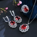 Elegante zilveren sieradenset met rode ovale stenen en zirkoon halo voor bruiloften - Rood (Maat 6)