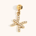18K gold plated Pisces zodiac pendant with micro-pave crystals on a white background - Pisces