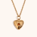 Collier médaillon coeur plaqué or 18 carats avec pierre orange et détail étoile - Novembre Jaune d'Or