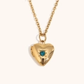 Collier médaillon cœur doré avec pierre de naissance bleue et gravure en étoile - Décembre Bleu Paon