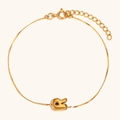 Minimalist 18K gold plated stainless steel bracelet featuring a puffed R letter pendant - Letter R / Gold