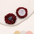 Close-up of dark red 3cm microfiber daisy flower patches with adhesive backing for DIY - Dark Red