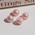 Macro shot of 12mm iridescent pink gradient faux pearls for DIY earring jewelry making - 1 Piece/Pack / Pink