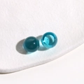 Macro detail of 14mm translucent blue jelly resin round cabochons for DIY jewelry making - 1 Piece / Lake Blue