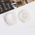 Detailed view showing front and back of 4cm white plush faux fur balls for DIY jewelry - White