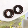 Close-up of dark brown wooden circular rings for DIY earrings on a white surface - Dark Brown