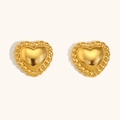 Detailed view of gold heart stud earrings with twisted rope border and polished finish - Twist Border Heart Earrings - Gold