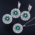 Detail of floral emerald green zircon jewelry set including necklace ring and earrings - Green