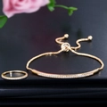 Set gioielli in oro con zirconi con bracciale regolabile e anello a fascia coordinato - Taglia 6 / Oro