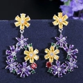 Colorful floral hoop earrings with silver pins and vibrant zircon crystals in garden style - Purple