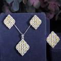 Macro-opname van sieradenset met gele marquise zirkoon en zilveren pavé-afwerking - Maat 6 / Ketting Oorbellen Ring 3-Delige Set / Geel