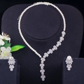 Elegant bridal jewelry set with pearl necklace and leaf-shaped zircon earrings on black velvet - Necklace & Earrings