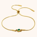 Verstellbares Gold-Schlangenarmband mit grünem runden Zirkonia-Stein und Gleitverschluss - Gold-Grüner Zirkonia