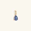 Elegant gold plated stainless steel teardrop pendant with a faceted deep blue gemstone - Tanzanite