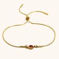Adjustable gold snake chain bracelet with a round red zircon stone and sliding clasp - Gold-Garnet Red Zirconia