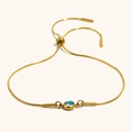 Adjustable gold snake chain bracelet featuring a round inlaid blue zircon stone - Gold-Sea Blue Zirconia