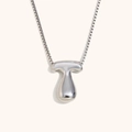 Collana minimalista con ciondolo a lettera T a bolla argentata con finitura lucida - Colore Acciaio-T