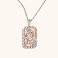 Collier pendentif carré argenté avec caniche en émail rose et cristaux brillants - Capricorne / Acier