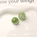 Detail of 16mm dreamy green resin beads with cat-eye effect for jewelry DIY making - Green