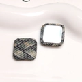 Detail of square plaid fabric buttons with flat silver metal backing for DIY crafts - Square
