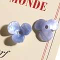 Macro shot of lavender pearl resin tulip flower charms with center hole for DIY jewelry - 1 Piece / Blue