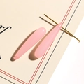 Detail view of pink translucent water drop pendant with golden T-pin for DIY earrings - Large / Pink