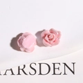 Macro view of pink iridescent resin rose flower charms for DIY jewelry accessories - Pink