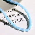 Macro detail of light blue glass bamboo-joint beads with delicate white silk textures - 1 Piece/Pack / Sky Blue