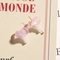Detailed view of pink resin balloon earrings with shiny sequins on vintage paper - Light Pink (B74-2-9-18)