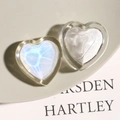 Close-up of iridescent heart-shaped resin phone grip with transparent acrylic base - White