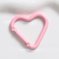 Macro view of a heart-shaped pink carabiner hook with a spring gate for DIY keychains - Light Pink