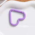 Macro detail of purple heart-shaped alloy spring clasp with smooth matte finish for DIY - Deep purple