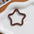 Detailed view of a dark coffee star-shaped spring clasp for DIY keychain accessories - Dark Coffee