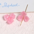 Detailed view of pink tulip acrylic beads with gold pins for DIY jewelry making - Pink