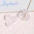 Detailed macro view of translucent white acrylic 3-petal flower DIY jewelry accessories - White