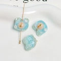 Macro de breloques d'ours en résine pailletée bleu clair avec détails d'étoiles DIY - Bleu