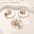 Three-piece ocean themed resin charm set with starfish and pearls for DIY crafts - Gold