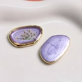 Lavender resin jewelry charm with golden metal edges and delicate white dried flowers - Light Purple Dried Flower